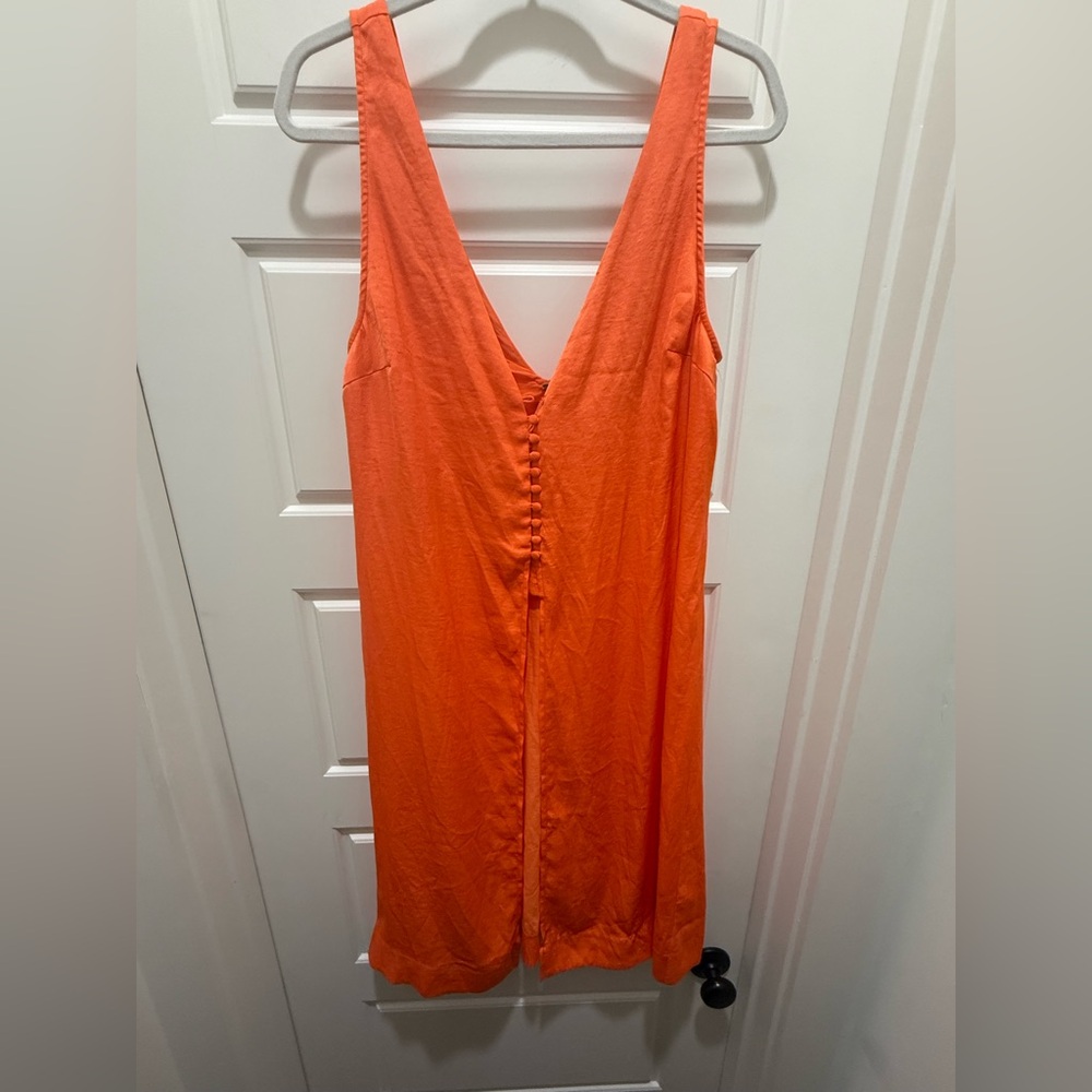 Free People. Orange Long Sleeveless Vneck Front & Back Blouse. Size 12.
